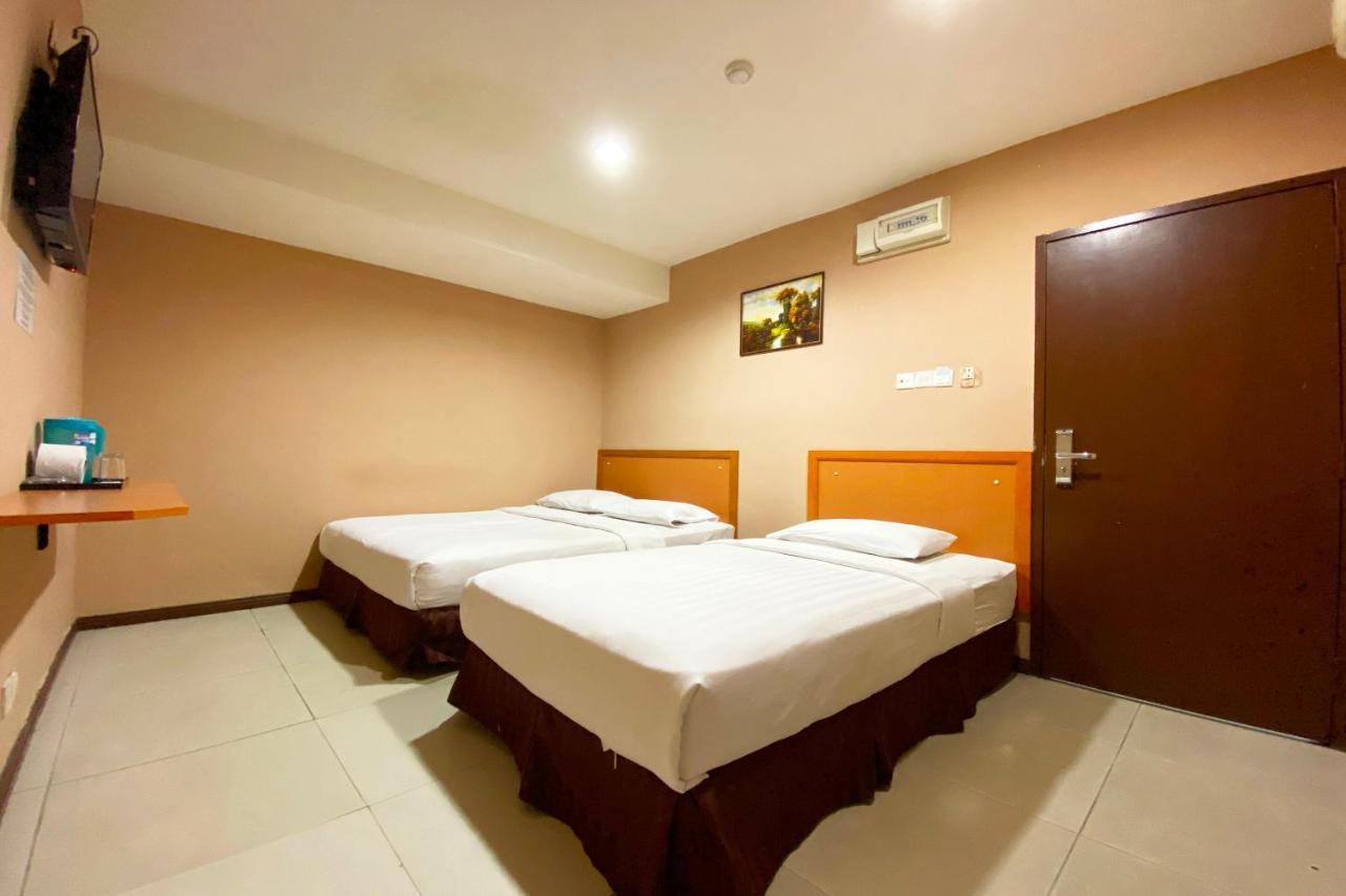 Oyo 90108 Hotel Kaya Kota Kinabalu Luaran gambar